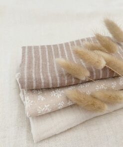 hydrofiel spuugdoekjes met diverse prints en neutrale kleuren.