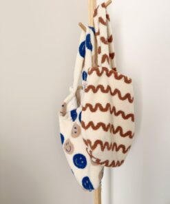 teddy mombag met smilies en waves. Deze grote shopper met extra vakken is ook ideaal als luiertas.