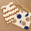 de warmste teddy gilet en bodywarmers voor jouw baby, peuter en kleuter! Stoer voor de boys met smilies of met de waves voor unisex gilet.